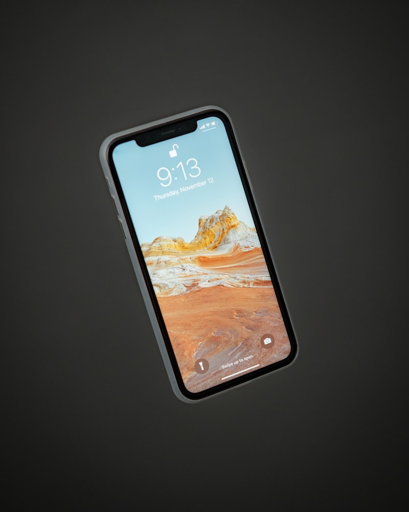 Close-up of a genuine iPhone box being opened to reveal the device inside.