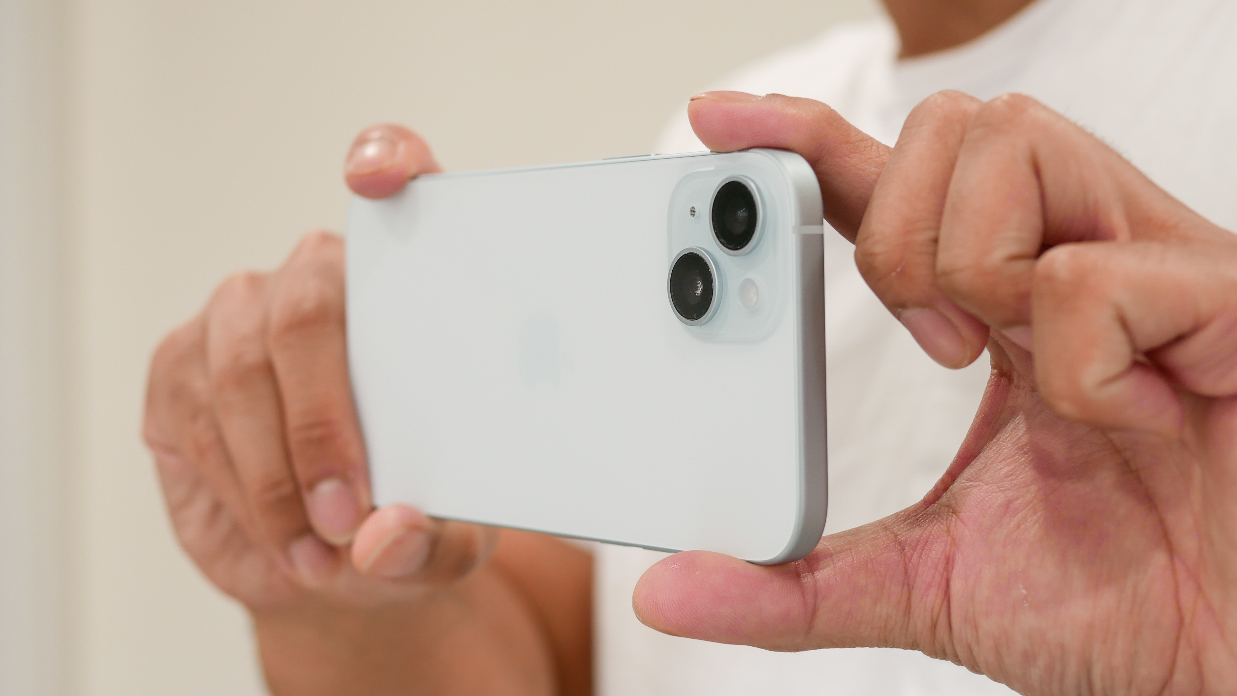 Close-up of the 48MP main camera module on the iPhone 15 Plus