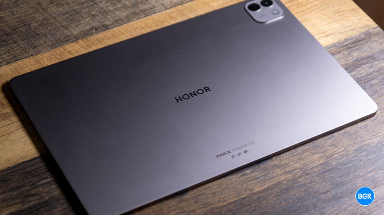 Rear view of the Honor MagicPad4 showing the camera module and sleek metallic finish.