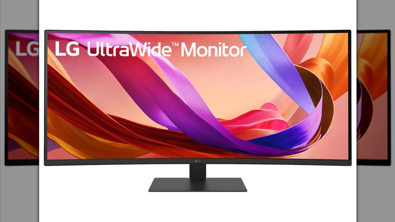 A high-resolution LG curved ultrawide monitor displaying a colorful background.