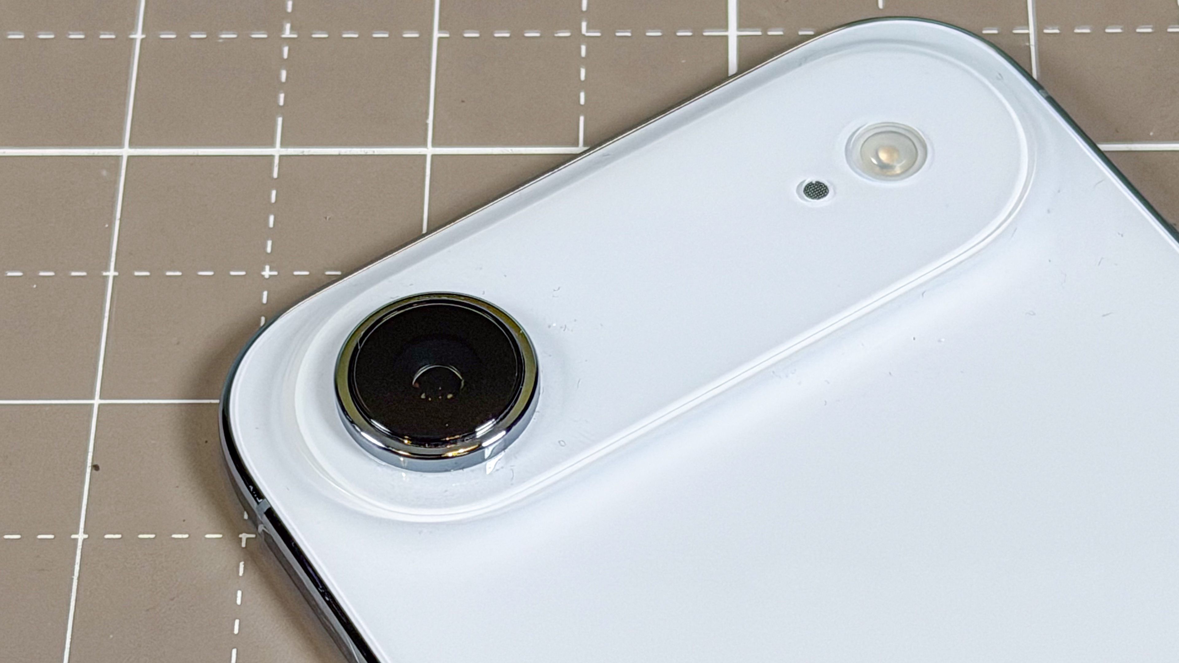 Close-up of the single 48MP Fusion camera on the rear of the iPhone Air.