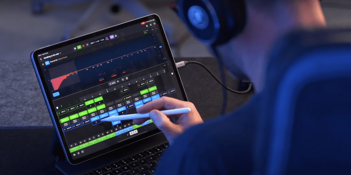 Close-up of a person using Final Cut Pro on an iPad Pro with a stylus.