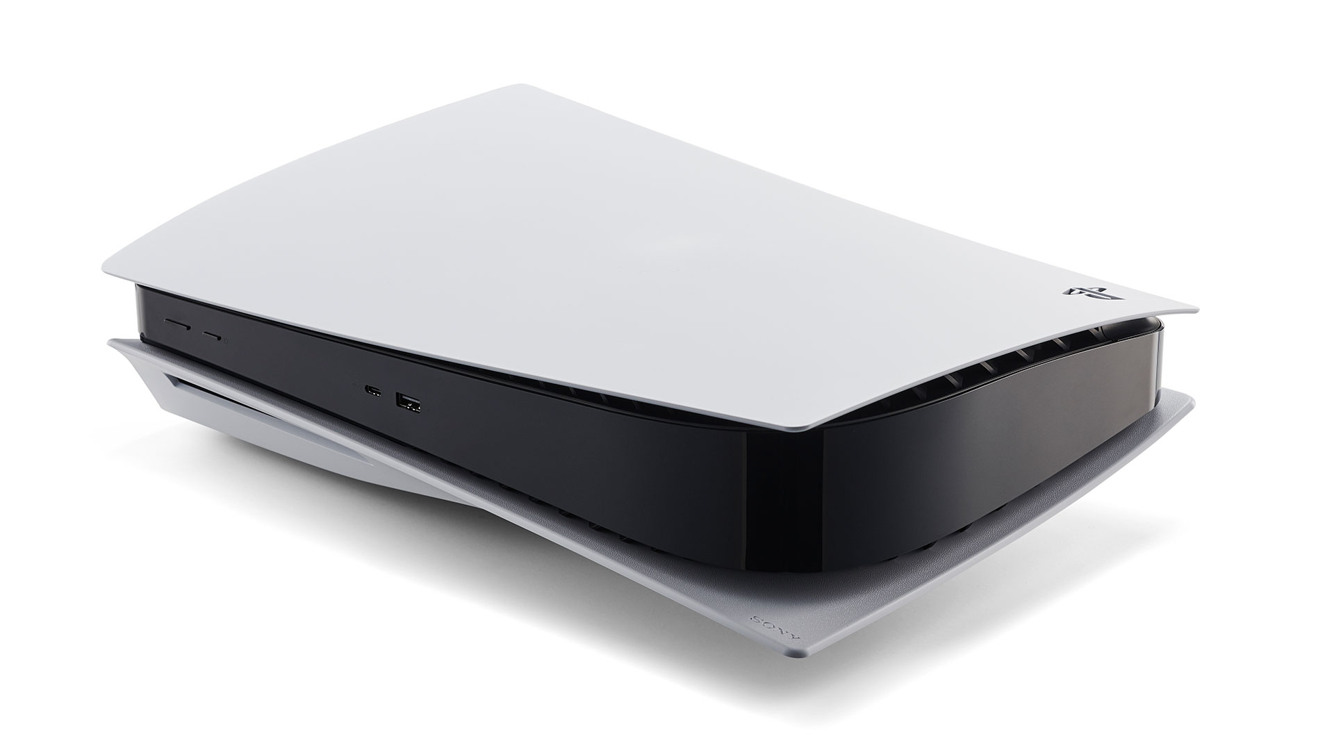 A white PlayStation 5 console and a DualSense controller positioned together.