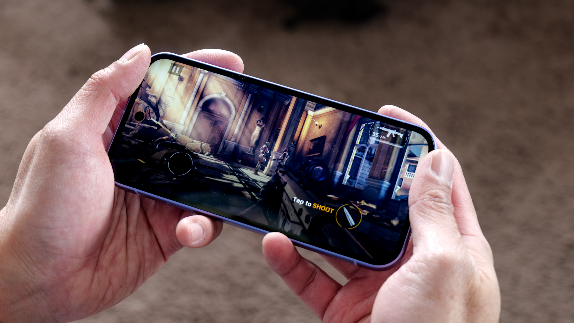 The Google Pixel 10a being used to play a first-person shooter game.