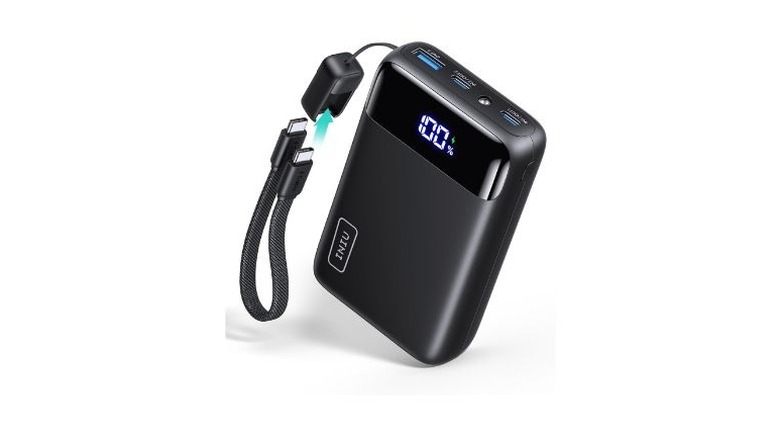 The INIU 22.5W portable charger featuring a digital LED battery percentage display.