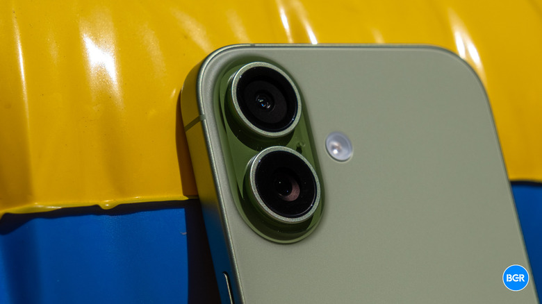 Macro shot of the dual-lens camera module on the back of the iPhone 17.