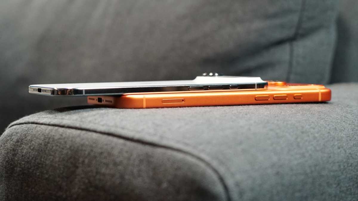 The iPhone 17 Pro Max and iPhone Air placed side-by-side to show size and design differences.