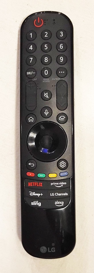 Close-up of the LG Magic Remote with its signature scroll wheel.