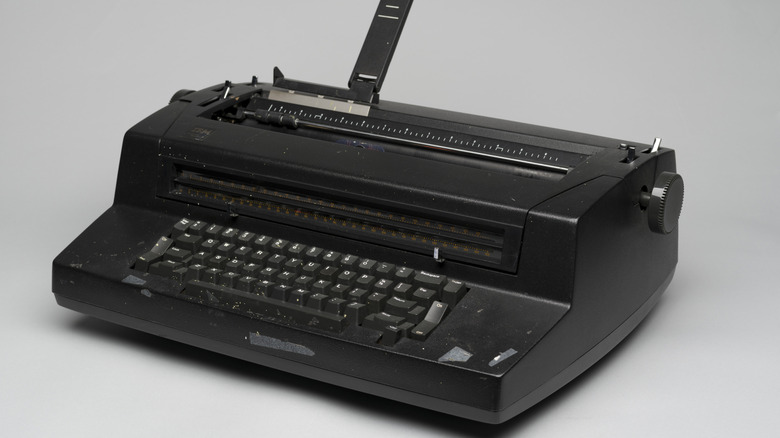 An IBM Selectric IIi electronic typewriter with its iconic spherical typing element.