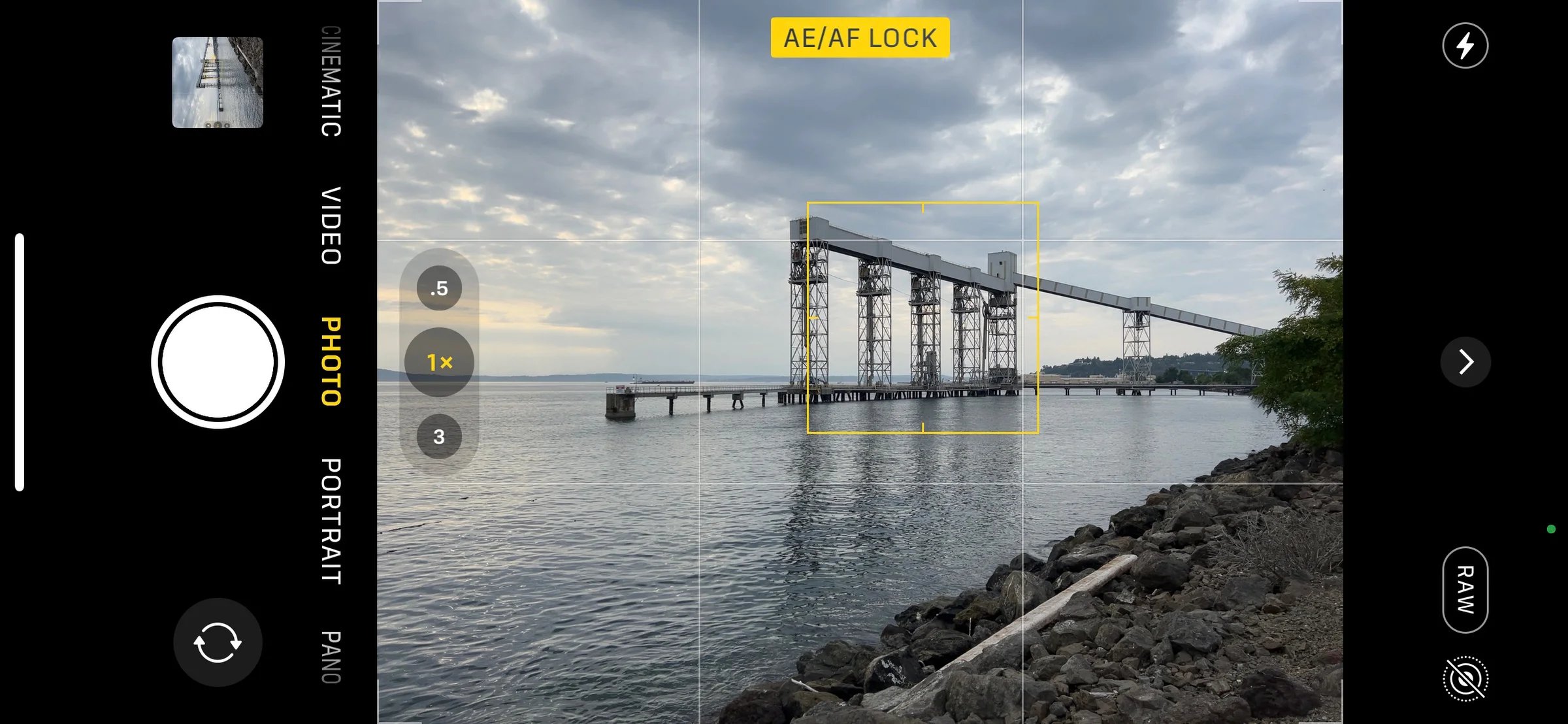 Smartphone screen interface displaying the AE/AF LOCK indicator during a photo capture.