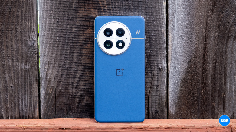 The textured rear panel of the OnePlus 13 showing its sleek and modern finish.