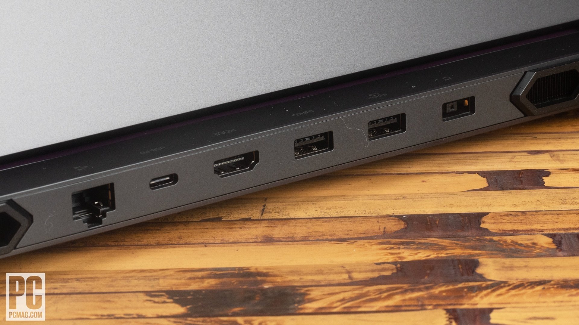Rear view of the Lenovo Legion Pro 7i Gen 8 showing Ethernet, HDMI, and USB ports.