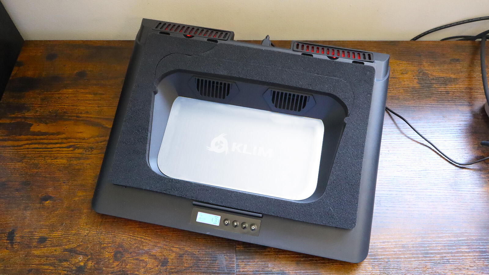 A Klim Everest laptop cooling pad featuring its unique twin-turbine fan configuration.