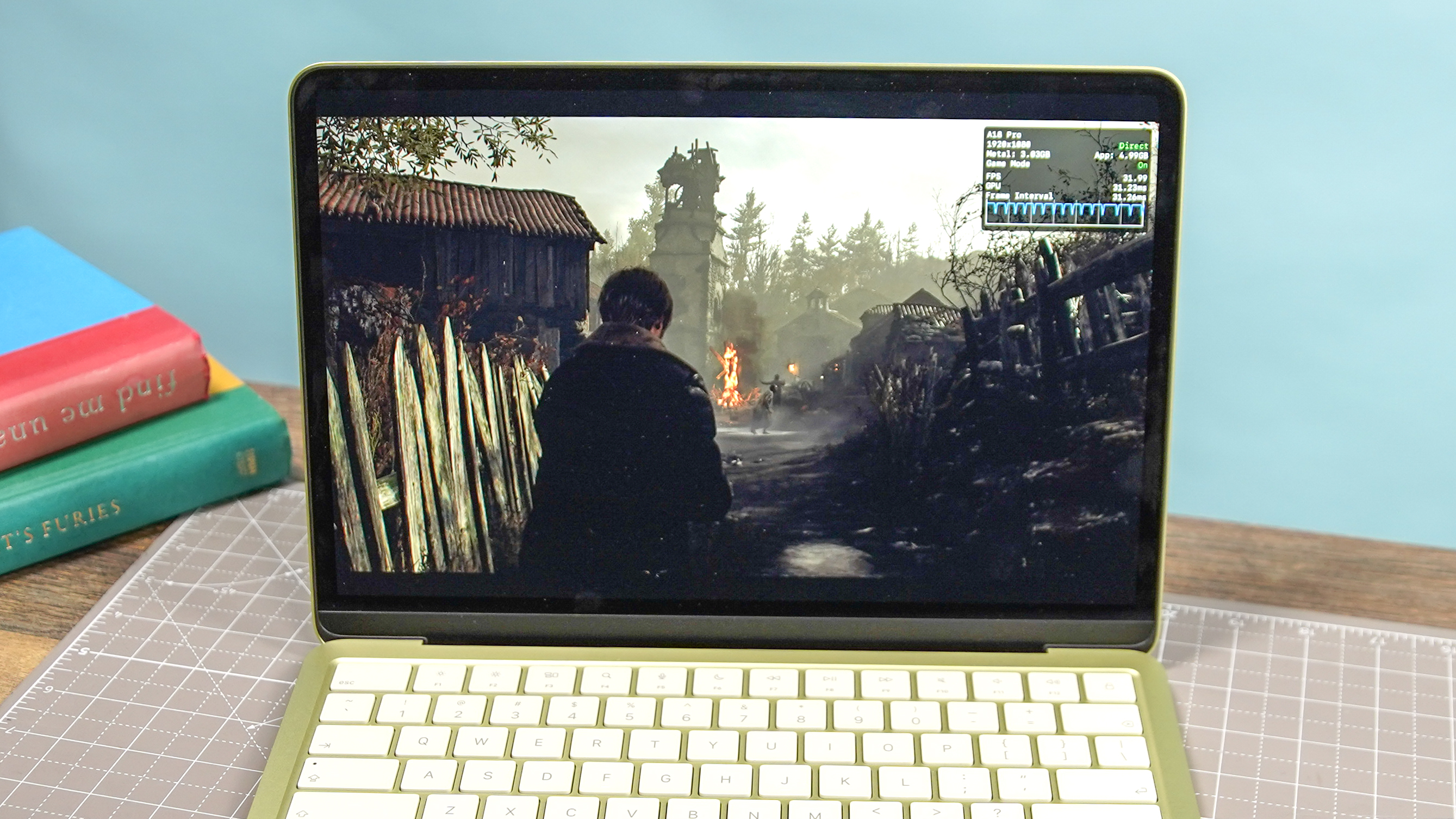 Resident Evil 4 Remake running on the MacBook Neo display.