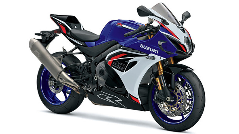 A blue and white Suzuki GSX-R1000 sportbike on display.
