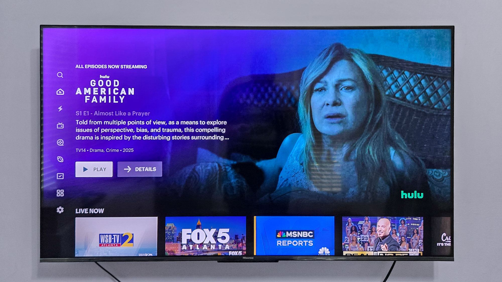 The Hulu + Live TV home screen featuring a mix of live channels and on-demand movies.