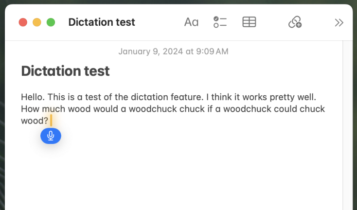 A close-up of the dictation interface on a macOS system.