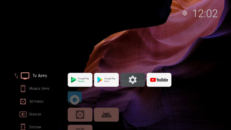 A smart TV running Projectivy Launcher with a minimalist app row and no advertisements.
