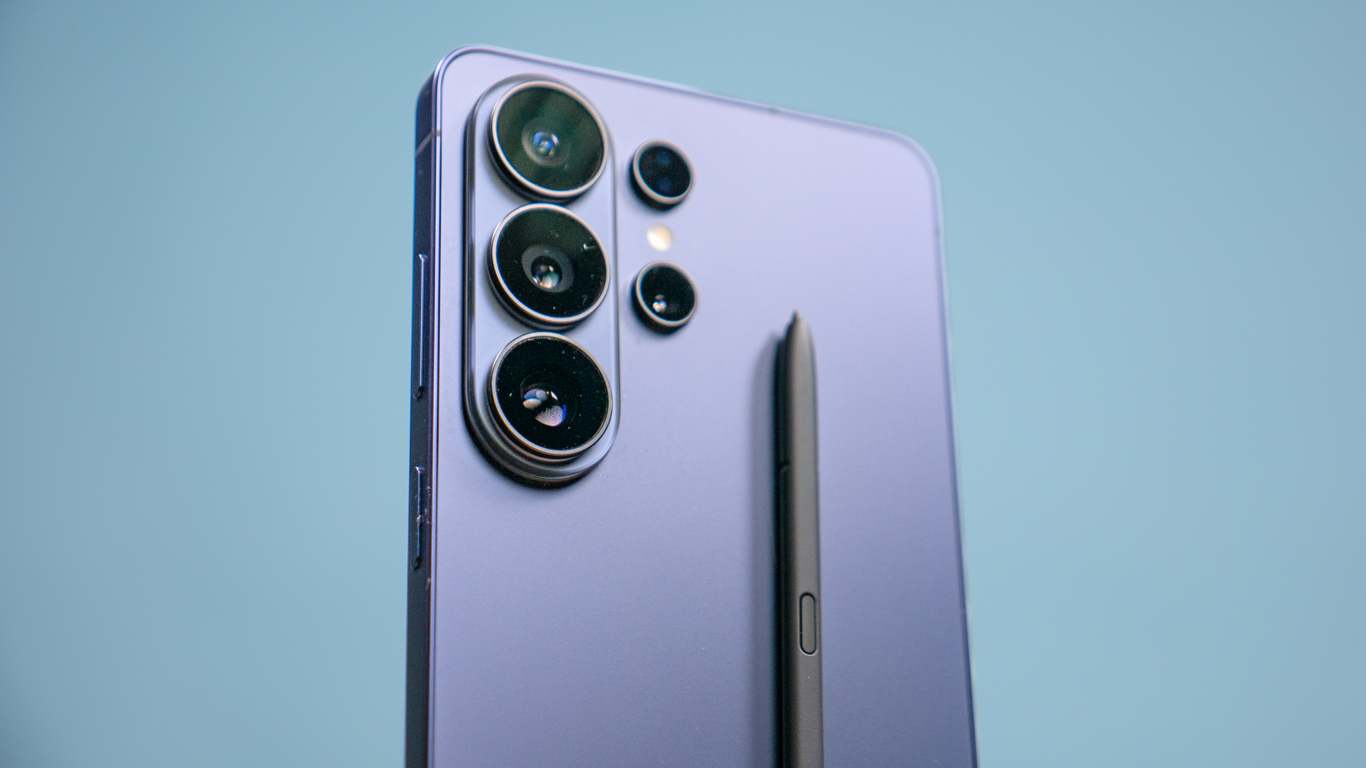 A person holding the Samsung Galaxy S26 Ultra showcasing its large, flat bezel-less display.