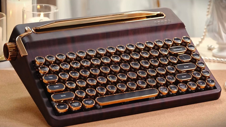 A brown Yunzii QL75 wireless mechanical keyboard with rounded typewriter-style keycaps.