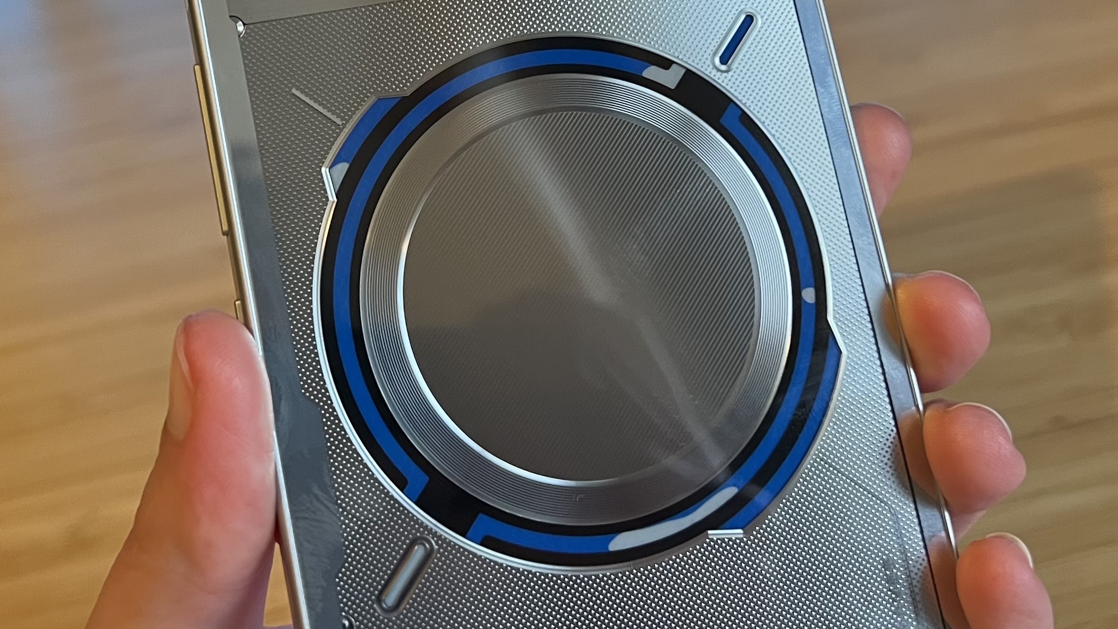 Detailed close-up of an internal liquid cooling vapor chamber on a high-end phone.
