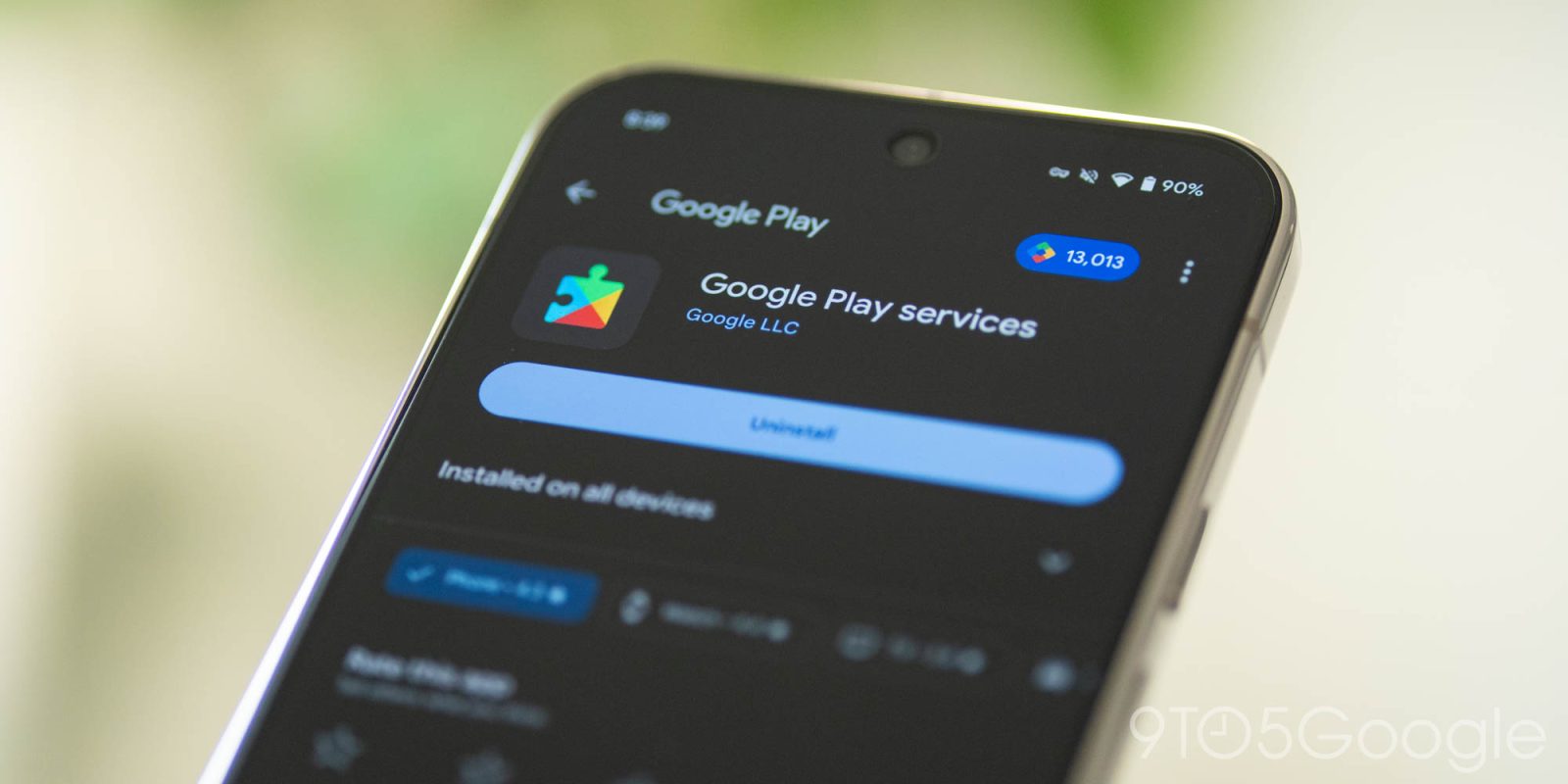 Close-up of a smartphone displaying the Google Play services system interface.