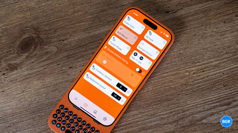 The Clicks companion app displayed on an iPhone screen.