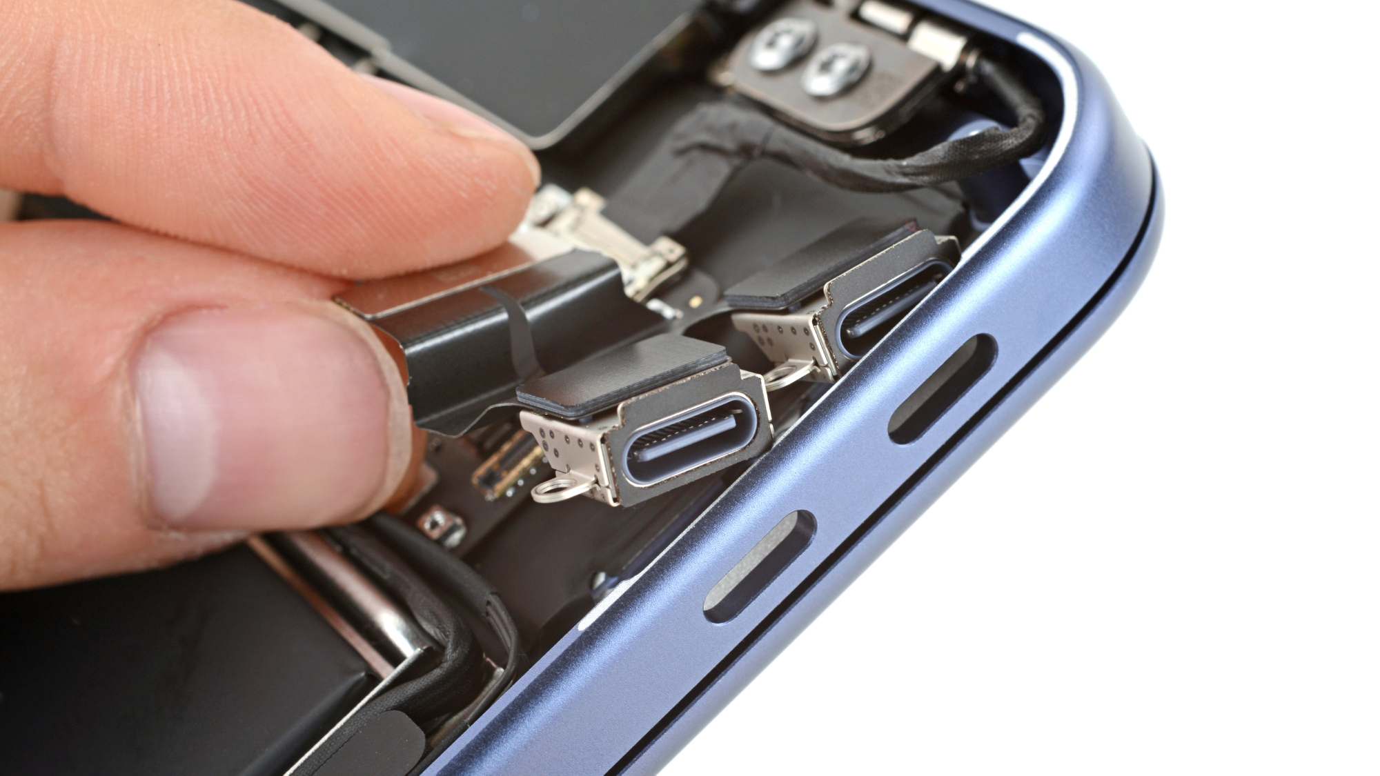 Close-up of a standalone modular USB-C port for the MacBook Neo.