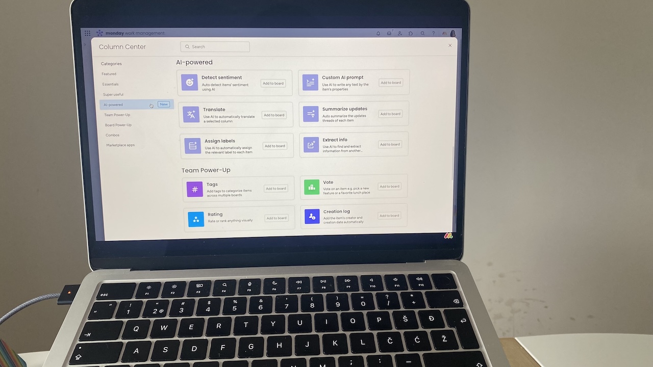 AI-powered column tools in a CRM for lead summarization and sentiment analysis.