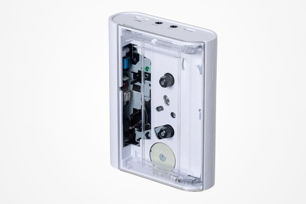 A clean white Toshiba Aurex AX-W10C portable cassette player with a minimal button layout.