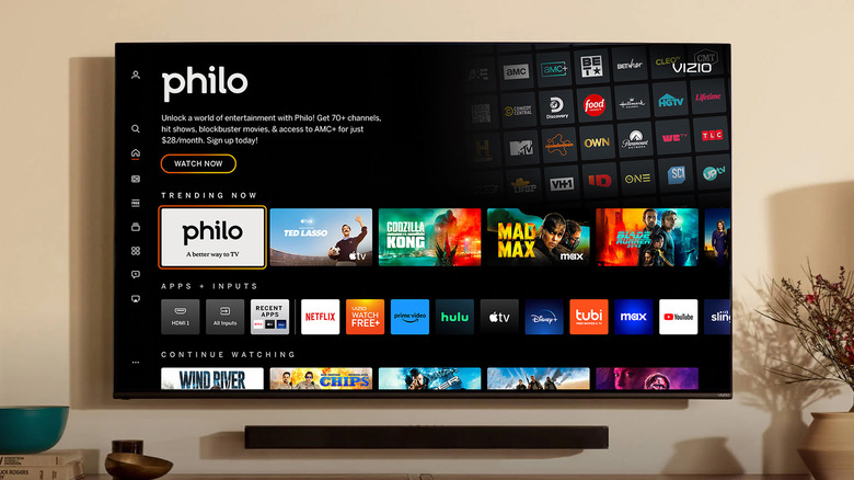 A television screen displaying the Philo home interface with lifestyle and reality TV show thumbnails.