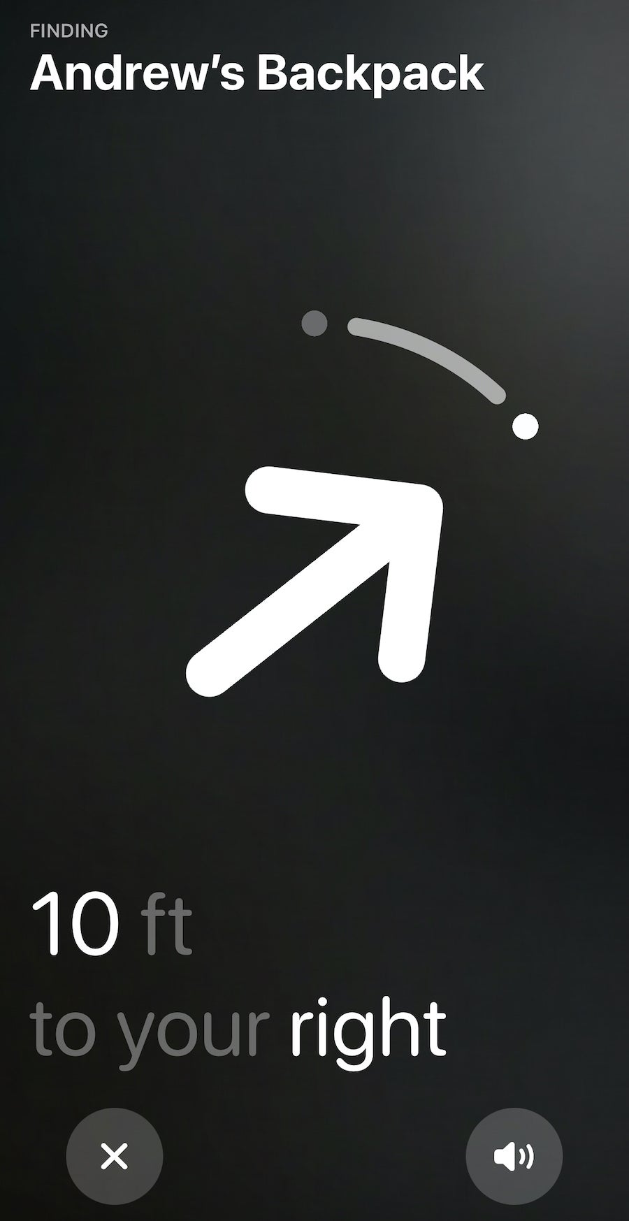 iPhone screen displaying the Find My app map with a precise location pin for an AirTag.