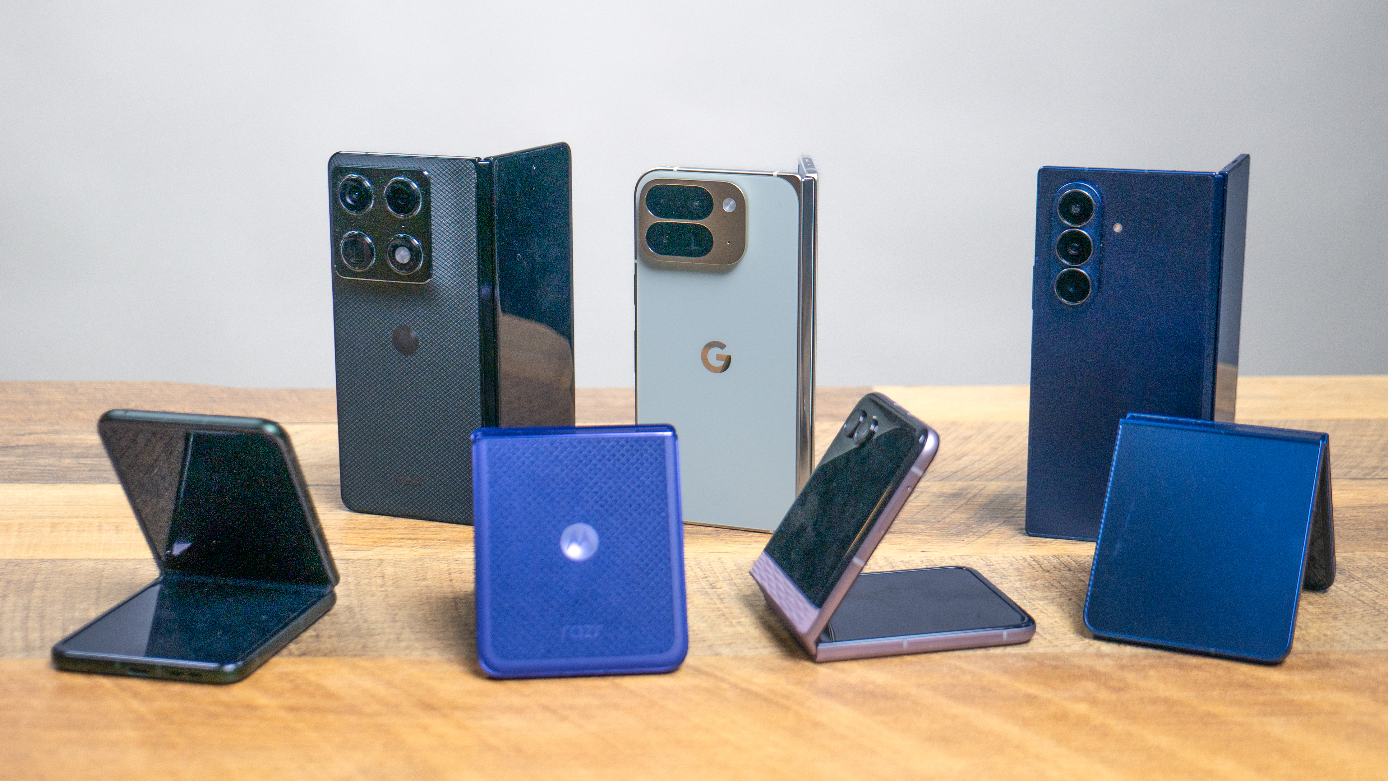 Comparative group shot of various 2026 foldable phones side-by-side.