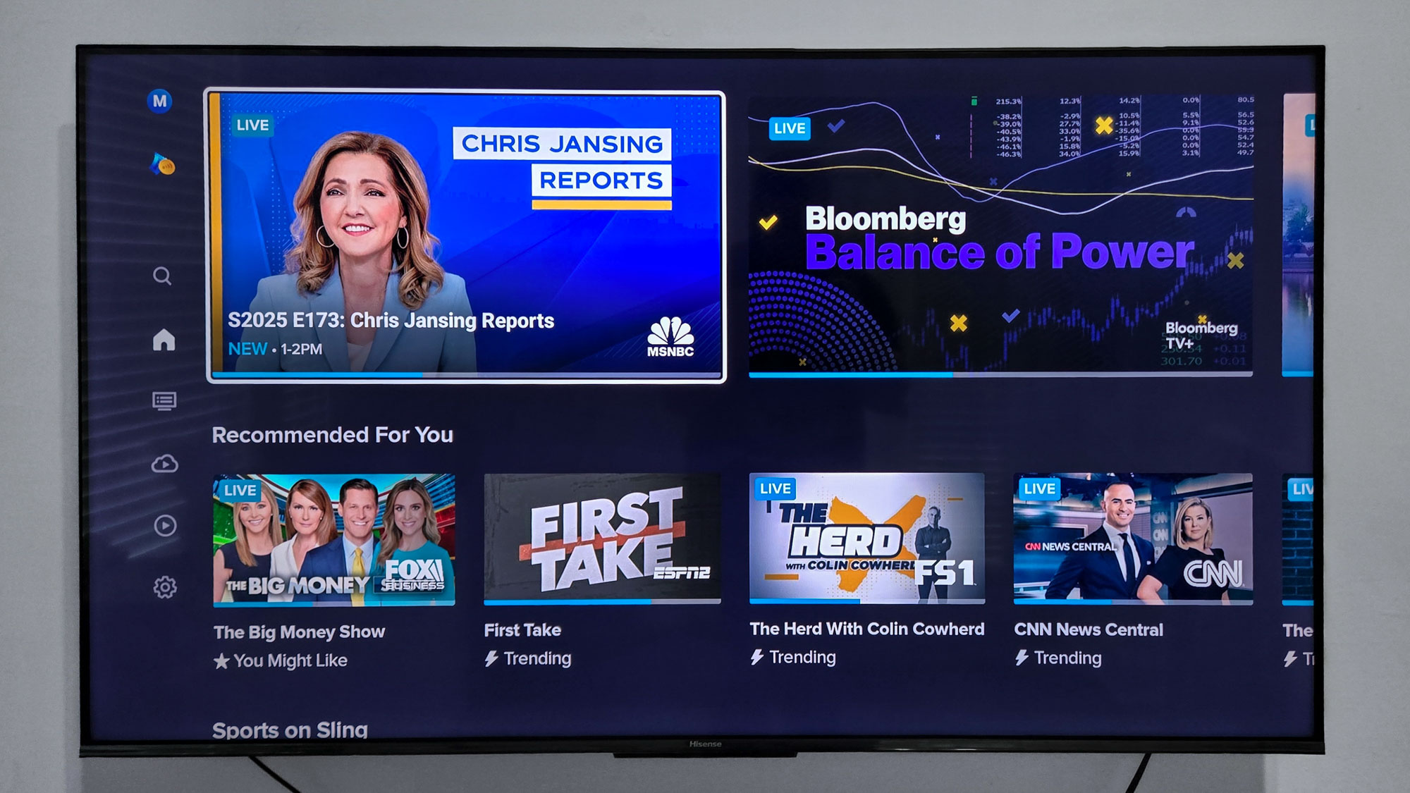 The Sling TV home screen showing channel categories and currently airing shows.