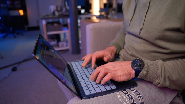Close-up view of the MacBook Neo screen showing the macOS desktop and a thin bezel design.