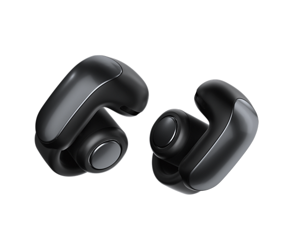 A pair of Bose Ultra Open Earbuds showing the flexible clip-on design.