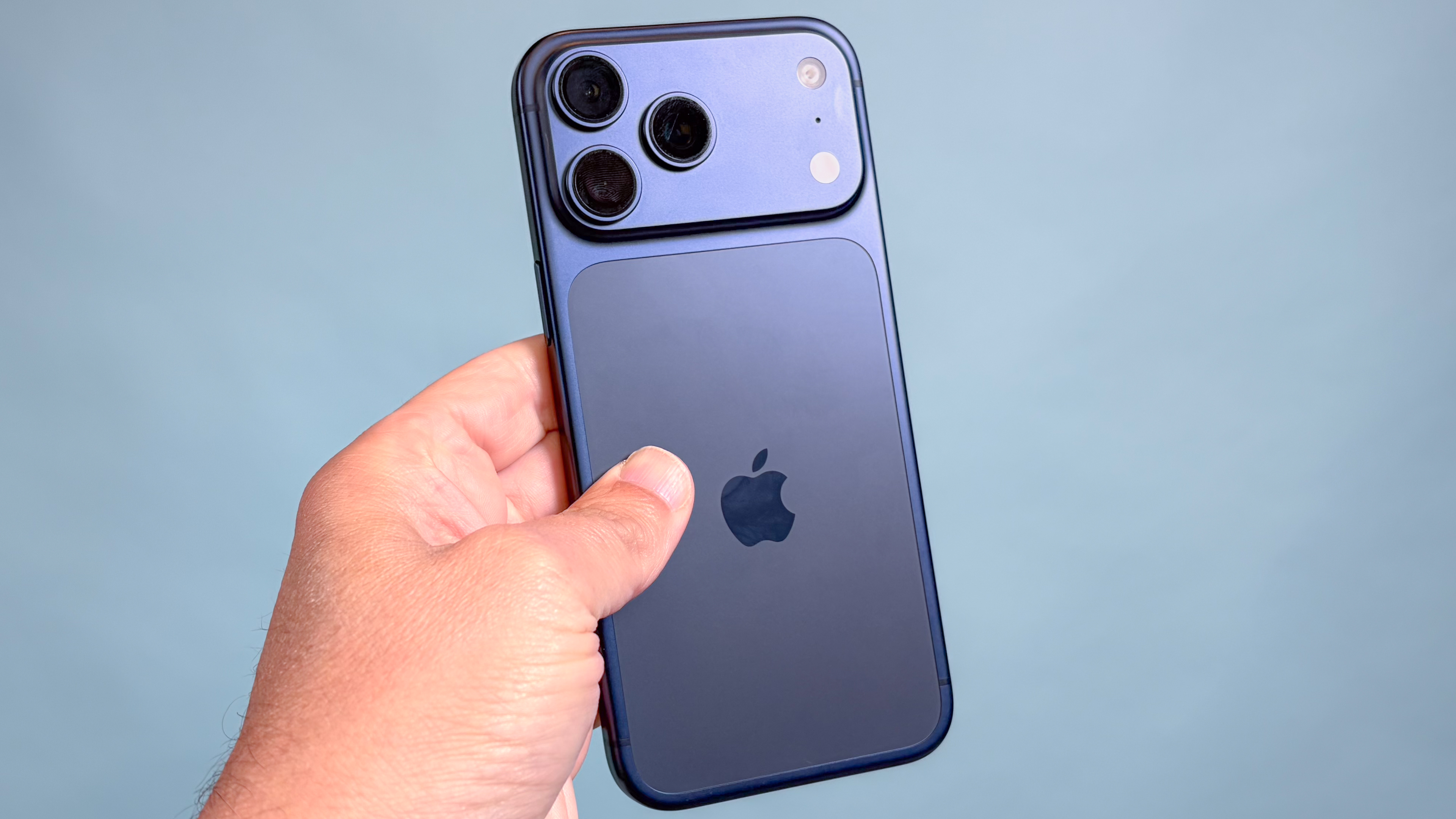 Front view of the iPhone 17 Pro Max highlighting its symmetrical flat screen and minimal bezels.