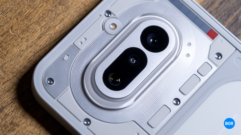 Macro view of the 50MP periscope telephoto lens and main sensor on the Nothing Phone (4a).