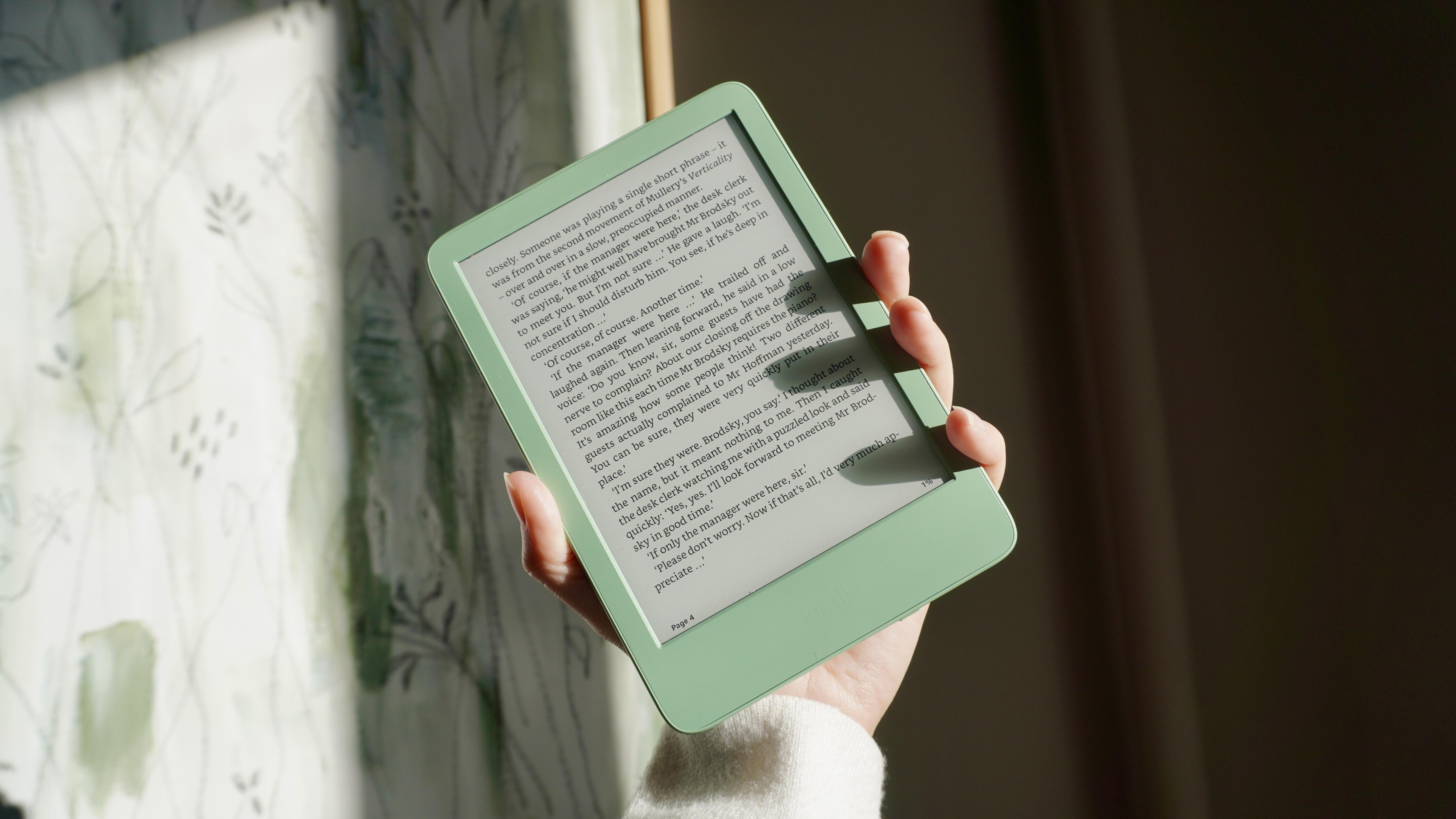 The 12th-generation entry-level Amazon Kindle shown in the Matcha Green color variant.