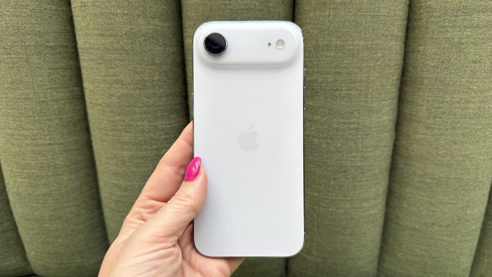 Side profile of iPhone Air highlighting its 5.6mm thickness.