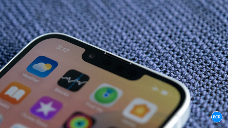 Close-up view of the classic notch design at the top of the iPhone 16e display.