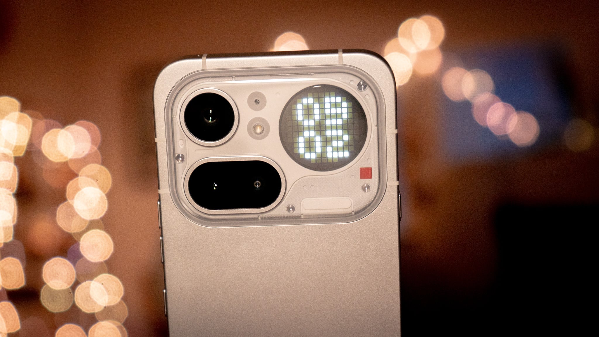 Close-up shot of the mini-LED Glyph Matrix on the back of the phone