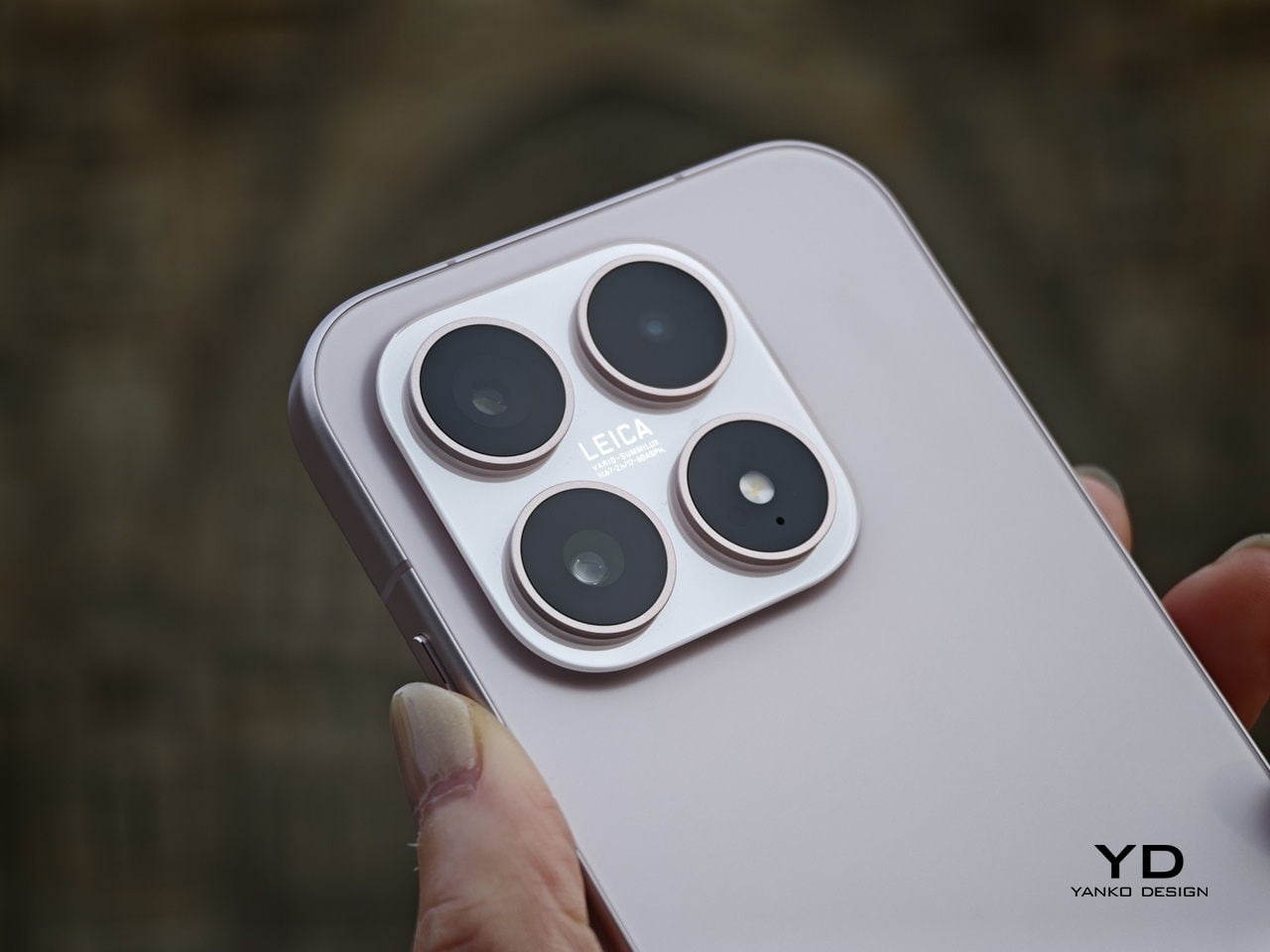 Close-up of the rear camera island on the Xiaomi 17 featuring three lenses.