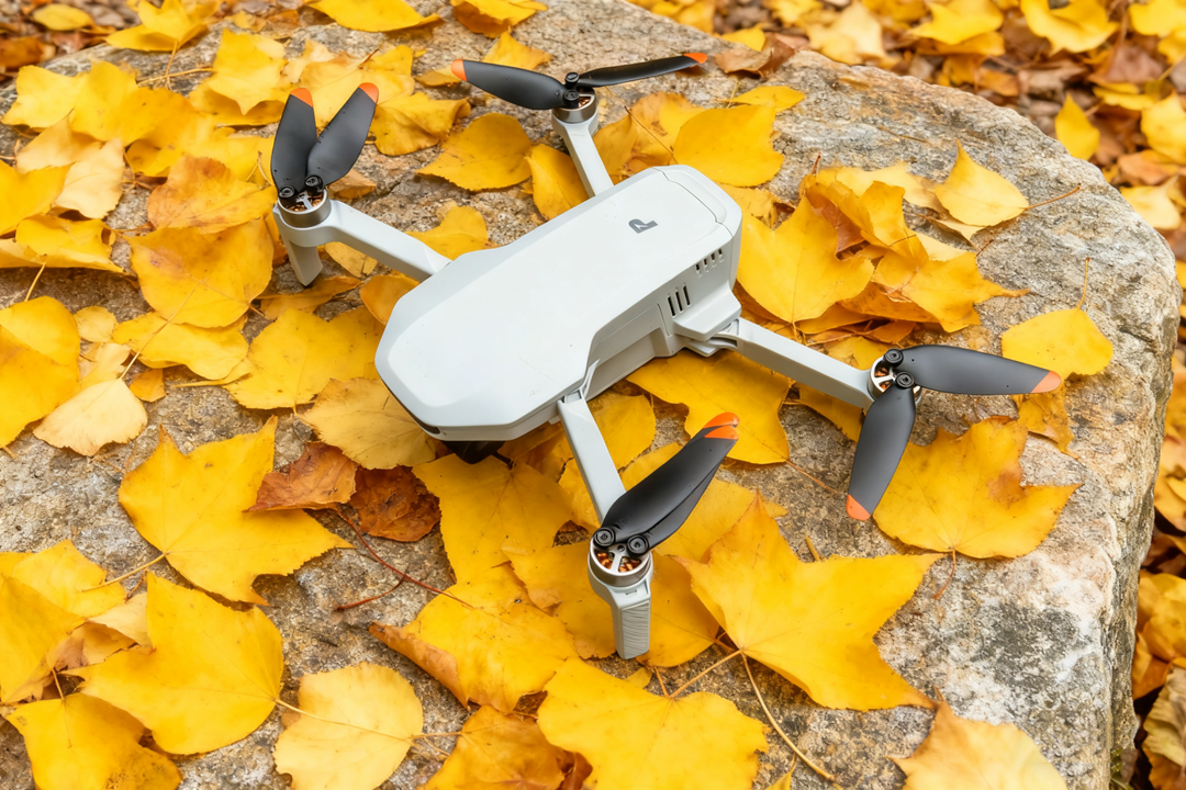 The Potensic ATOM SE, a compact and lightweight drone, resting on a surface.