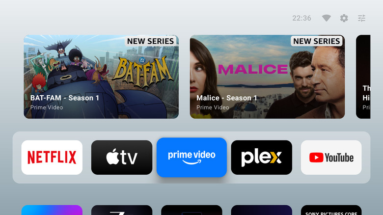 AT4K Launcher interface showing a polished grid of apps with high-quality icons.