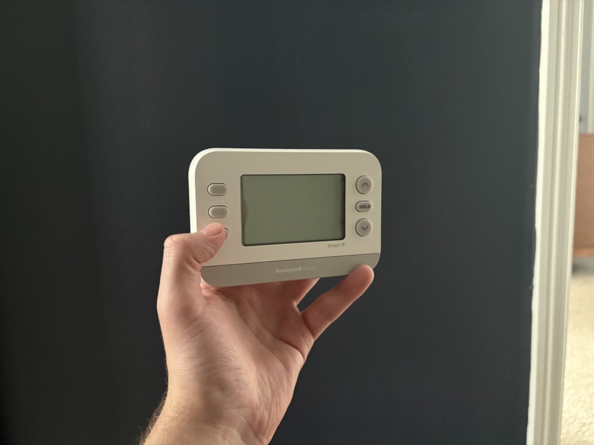 A Honeywell Home X2S Smart Thermostat showing a digital temperature display.