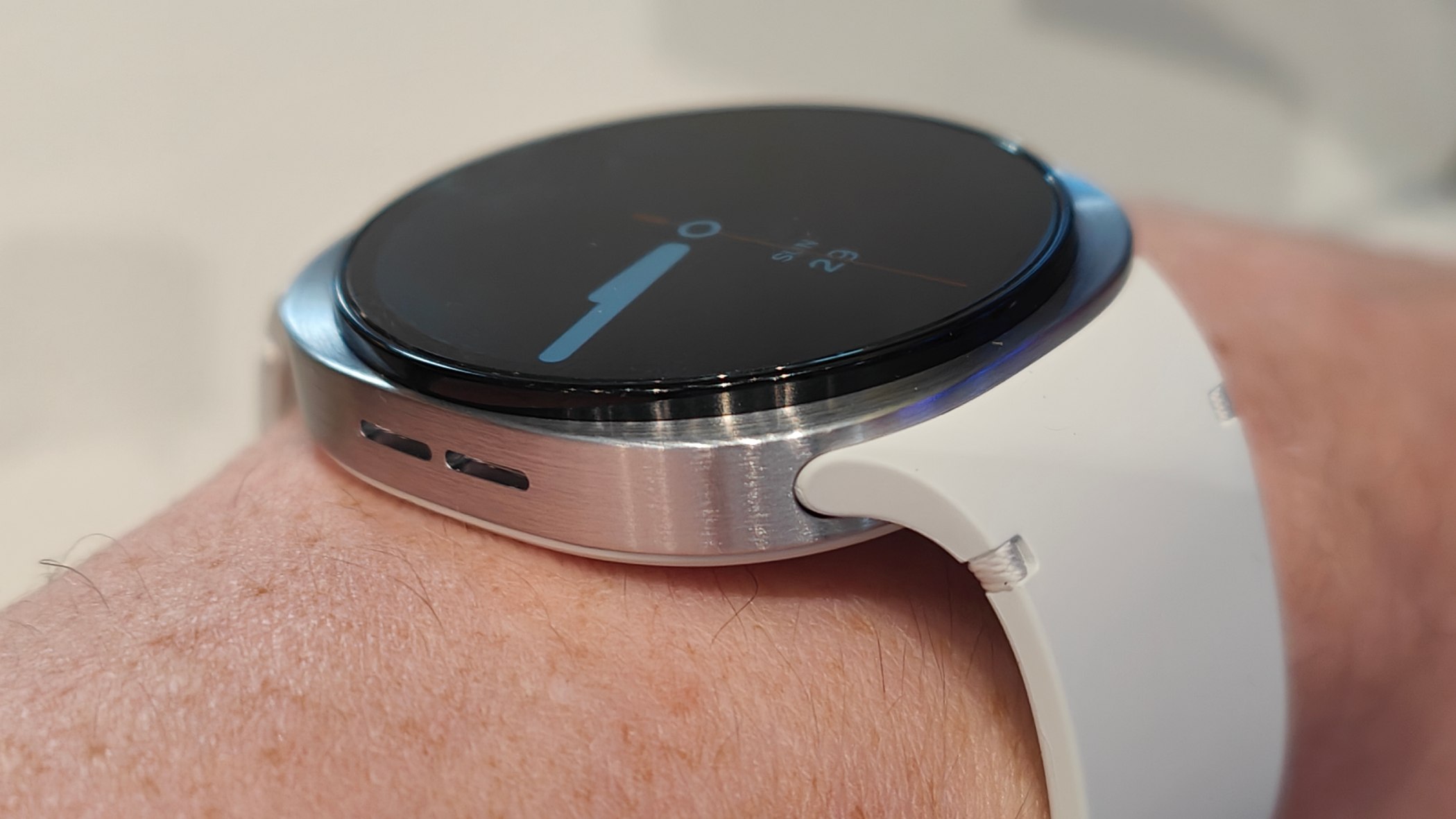 Samsung Galaxy Watch 8 showing a modern Material 3 design watch face.