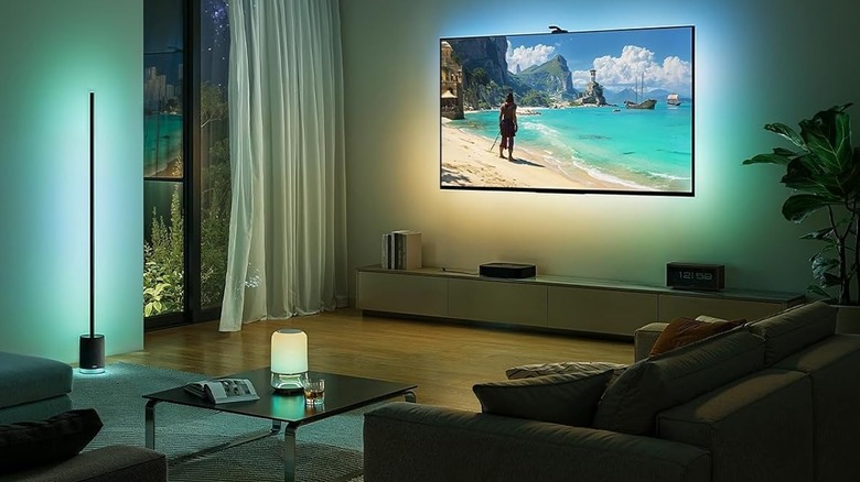 Govee smart backlighting synced with a television display and ambient room lamps.