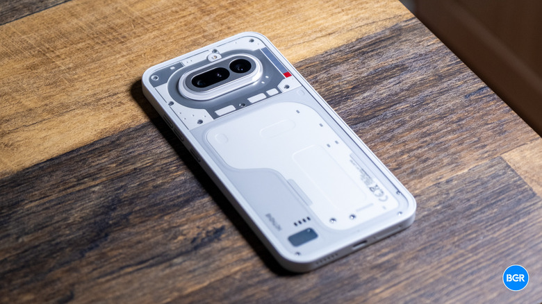 The rear transparent panel of the Nothing Phone (4a) showing internal components and branding.