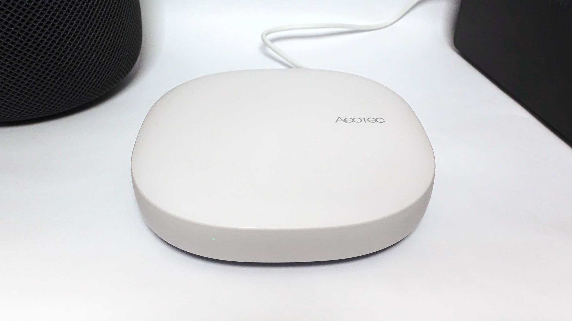A sleek, white Aeotec Smart Home Hub device displayed against a plain background.